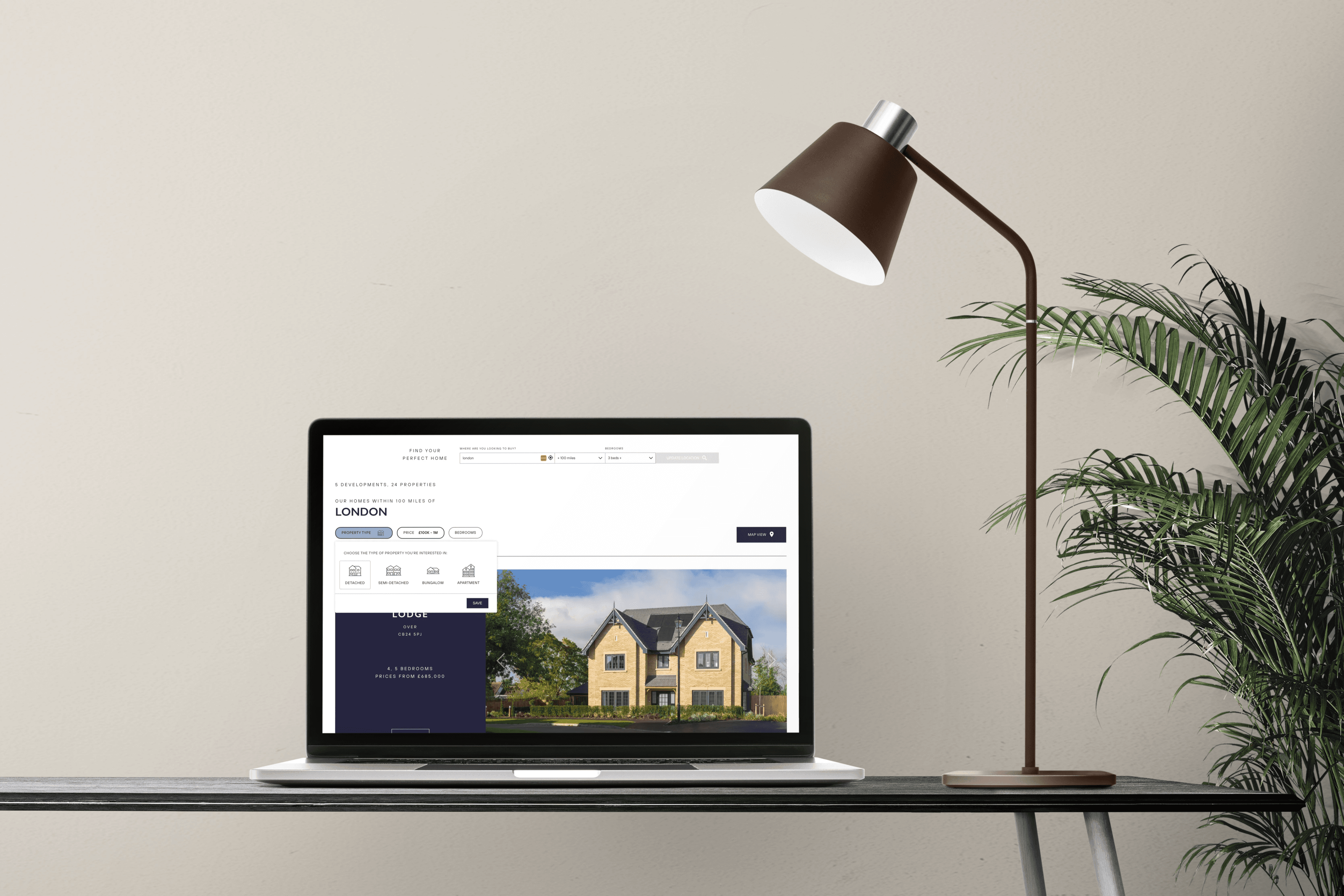 Hayfield Homes website on laptop
